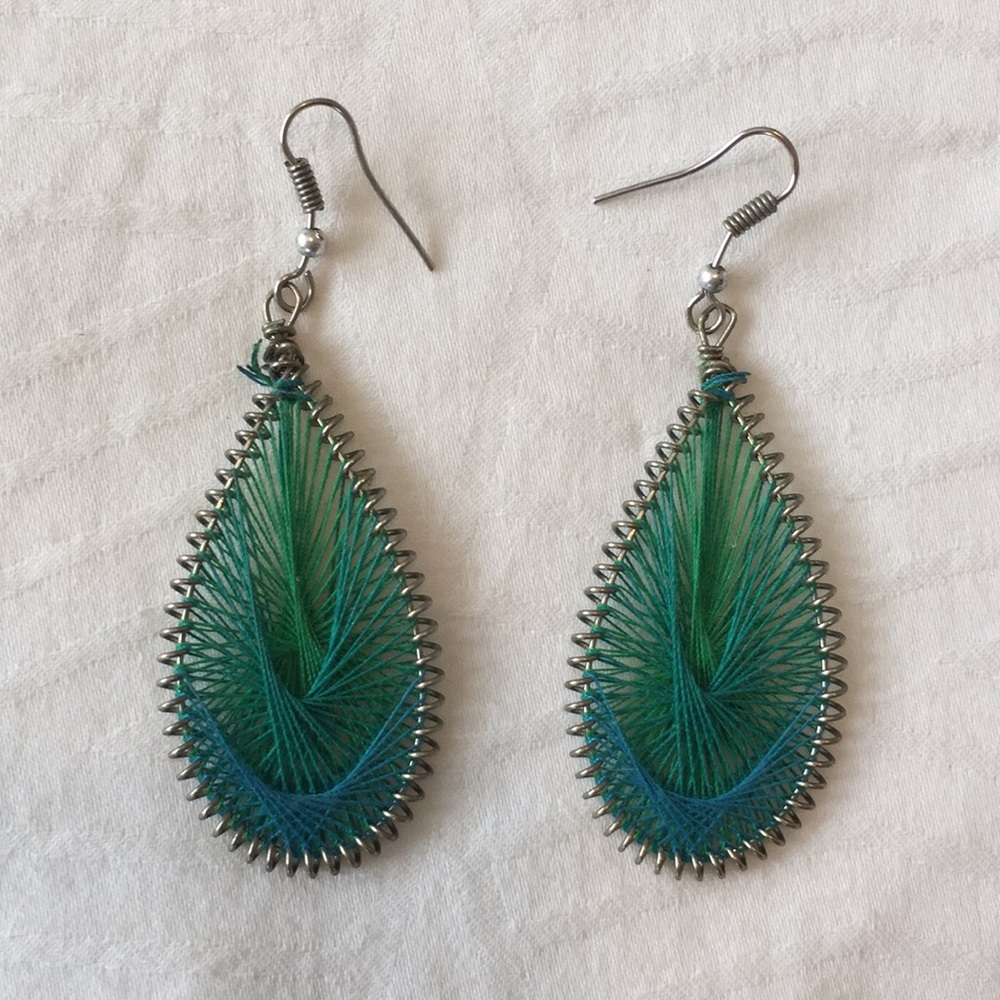 Earrings with colorful threading detail. EUC